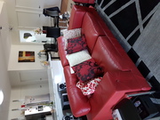 TWO RED LEATHER SOFA'S 